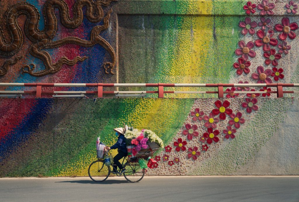 Colorful ceramic mosaic mural along a Hanoi street